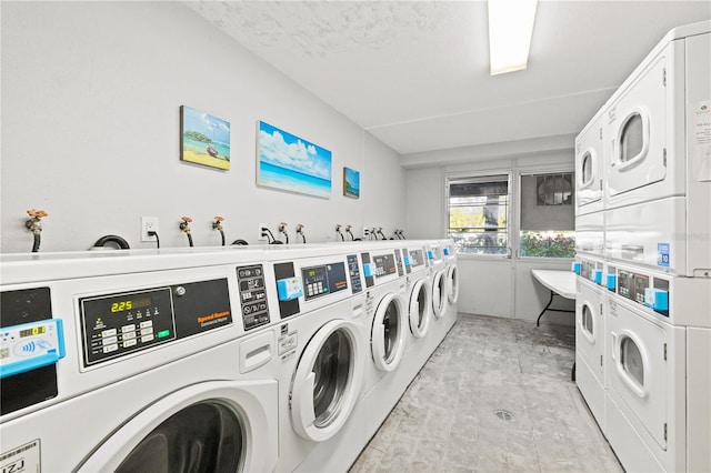 washroom with stacked washer / dryer and separate washer and dryer