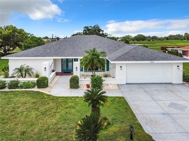 ranch-style house with a front lawn, covered porch, and a garage