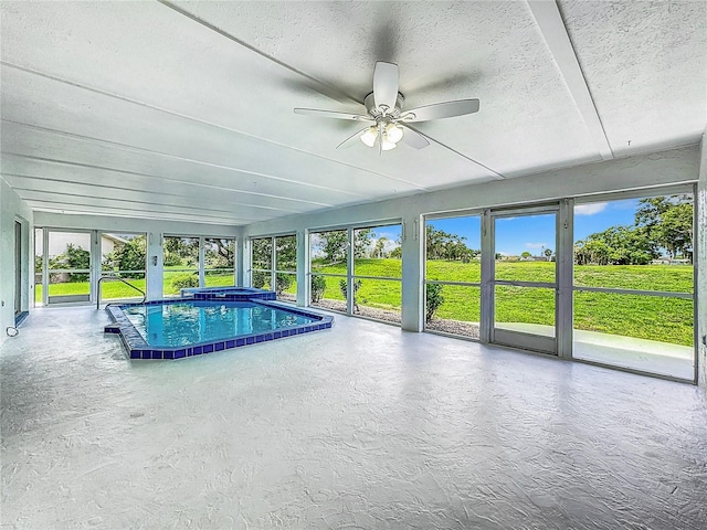 view of swimming pool with ceiling fan