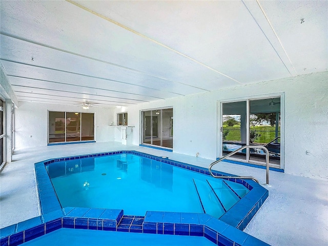 view of pool featuring a patio area