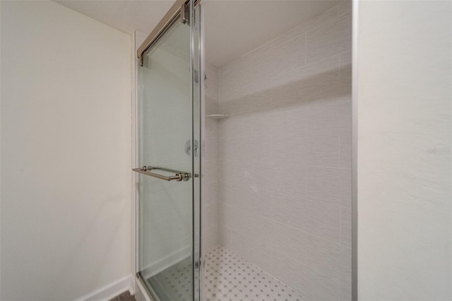 bathroom featuring walk in shower