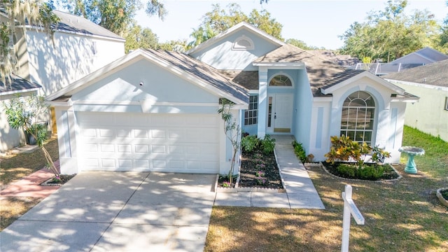 view of property featuring a garage