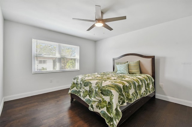 bedroom featuring dark wood-type flooring and ceiling fan