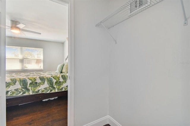 spacious closet featuring ceiling fan and hardwood / wood-style floors