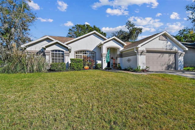 ranch-style home featuring a front yard and a garage