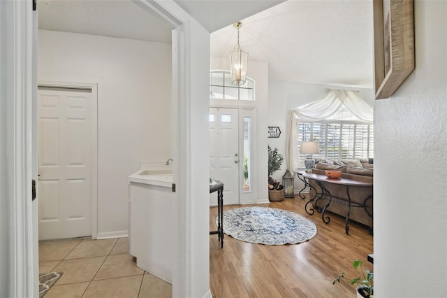 entrance foyer with light wood-type flooring