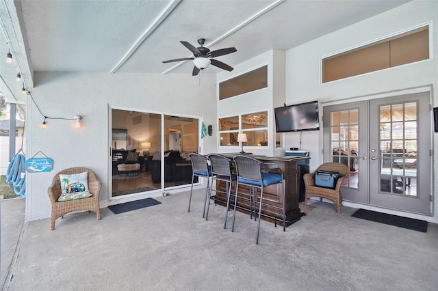 view of patio / terrace with french doors and ceiling fan