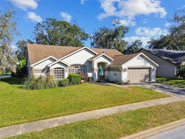 ranch-style home featuring a front yard and a garage