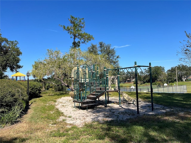 view of play area featuring a yard