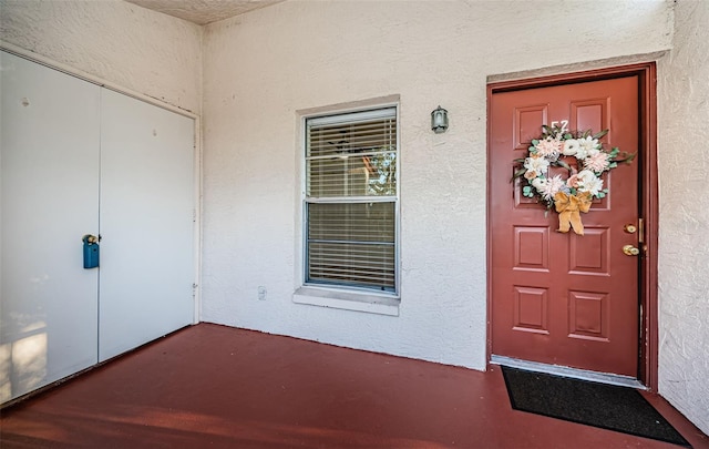 3455 Countryside Blvd Unit 52, Clearwater, FL 33761 - doorway to property with stucco siding