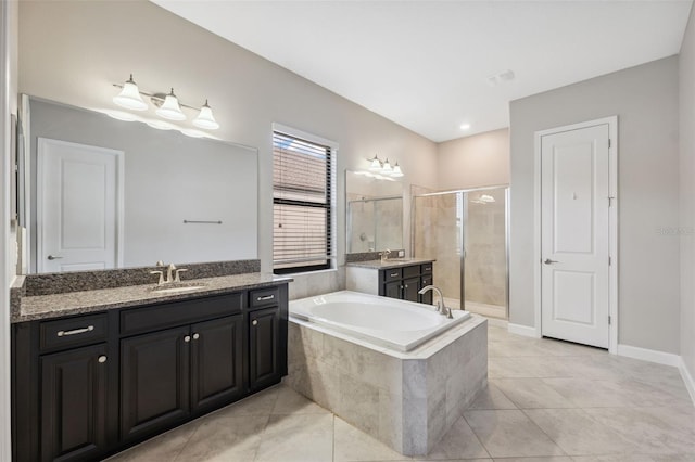 bathroom with vanity, plus walk in shower, and tile patterned flooring