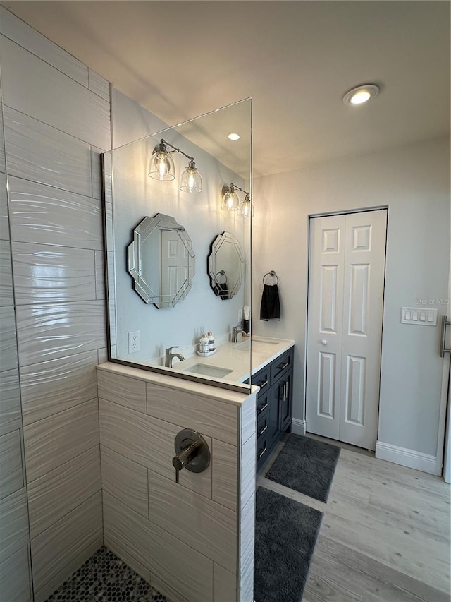 bathroom featuring vanity and wood-type flooring