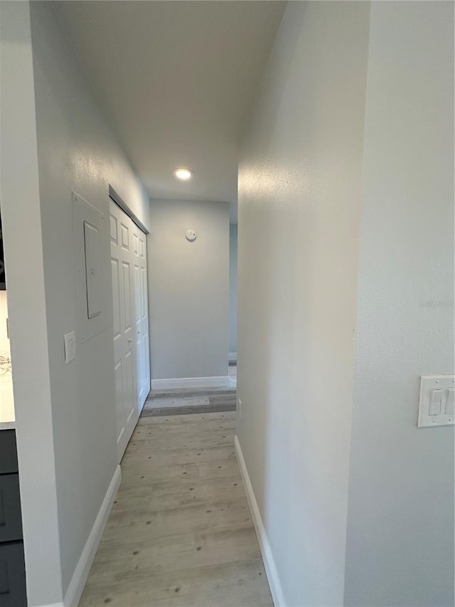 hallway featuring light hardwood / wood-style flooring