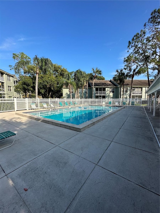 view of pool featuring a patio area