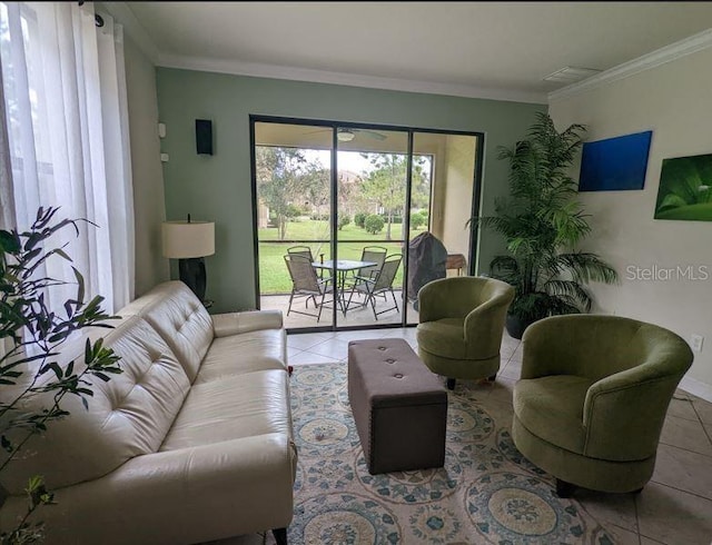 living room with crown molding and light tile patterned floors