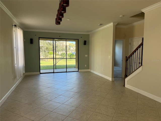 unfurnished room featuring ornamental molding and light tile patterned flooring