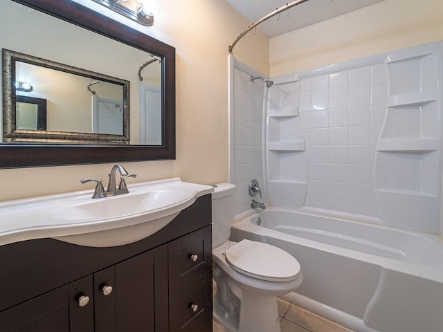 full bathroom featuring vanity, tile patterned floors, washtub / shower combination, and toilet