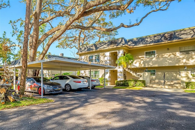 exterior space featuring a carport