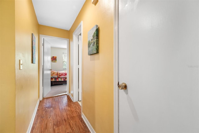 hallway featuring light hardwood / wood-style flooring