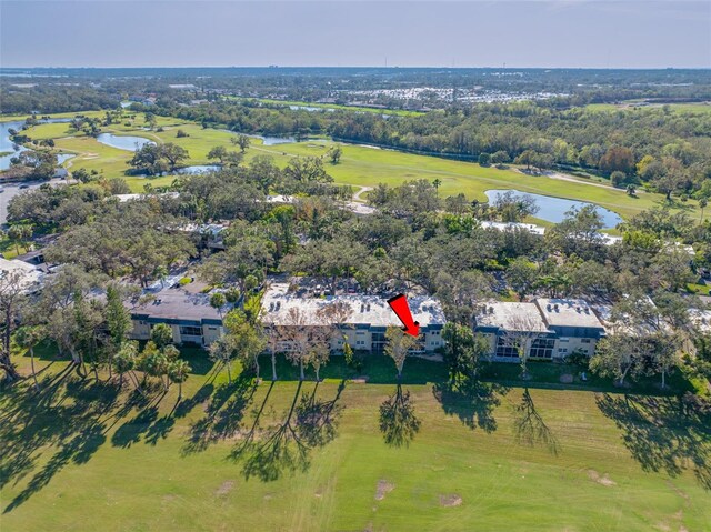 aerial view with a rural view and a water view