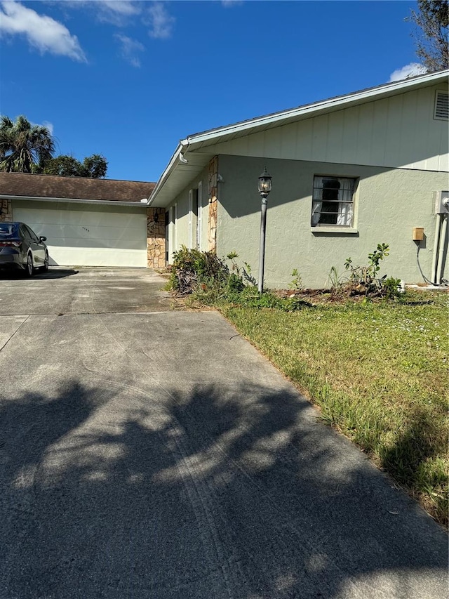 view of property exterior featuring a garage