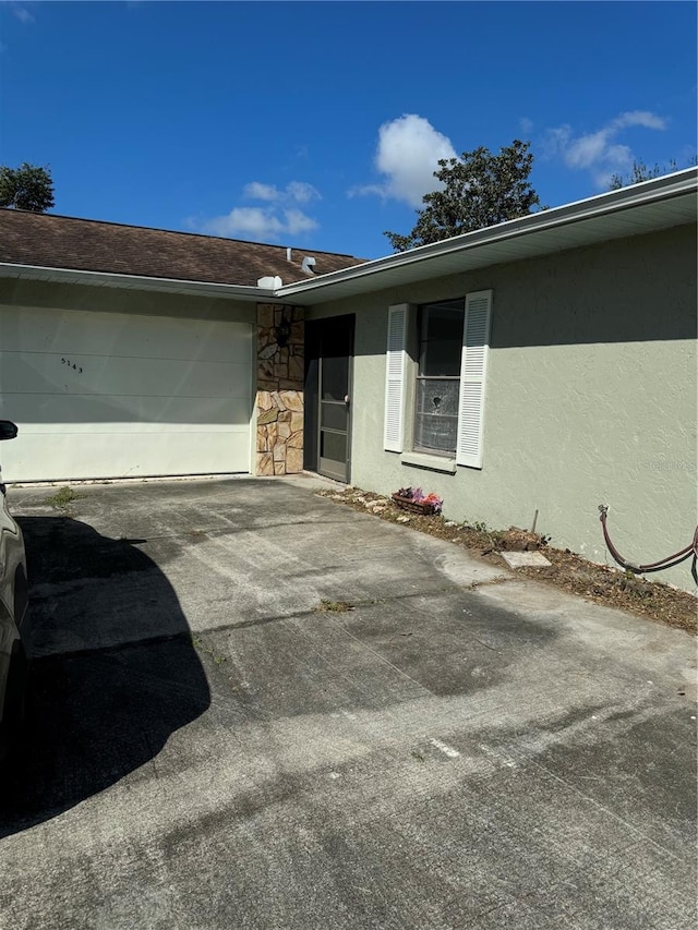 property entrance with a garage