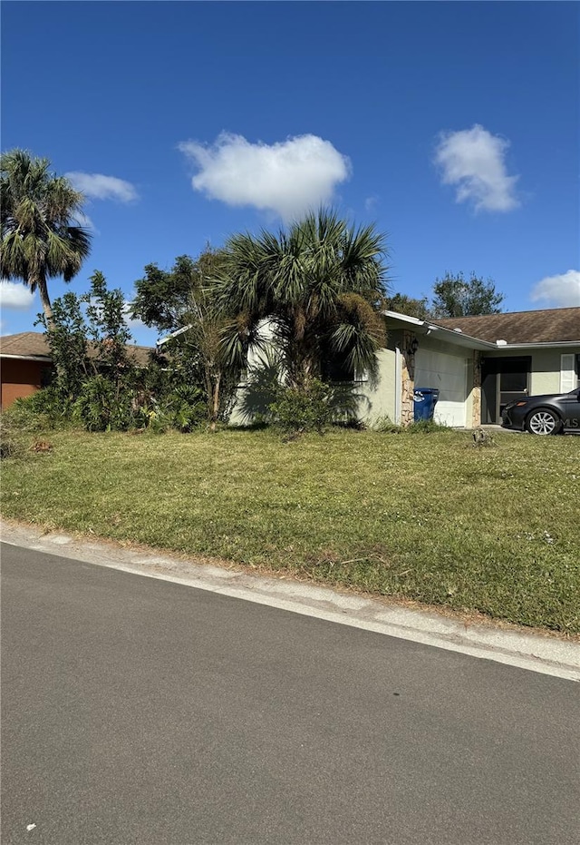 view of front of home with a front yard