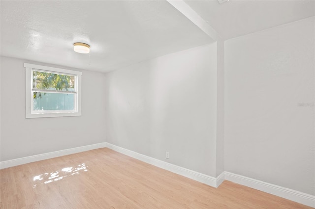 empty room with light wood-type flooring