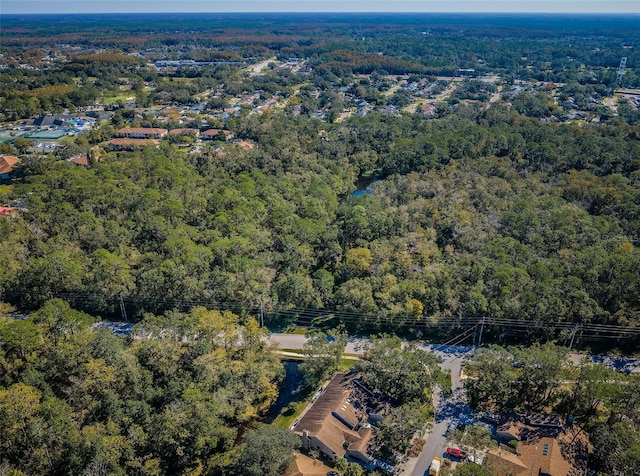 bird's eye view with a view of trees