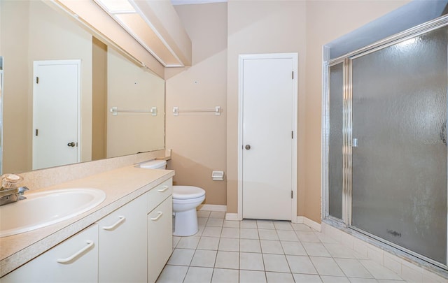 bathroom with toilet, tile patterned flooring, vanity, and a shower with door