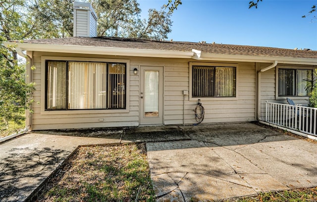 view of front of house with a patio area