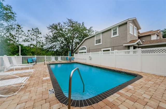 view of pool with a patio