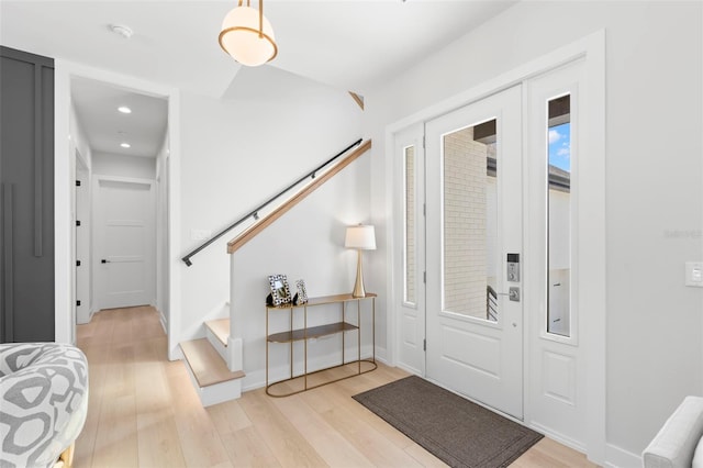 entrance foyer with light wood-type flooring