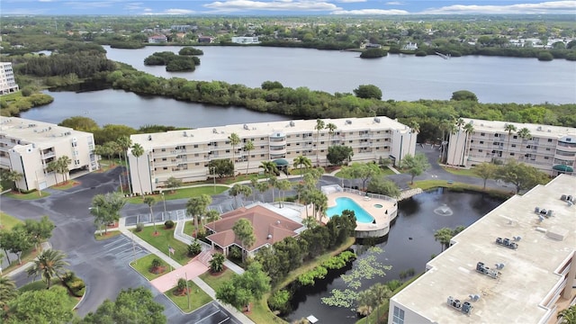 birds eye view of property with a water view