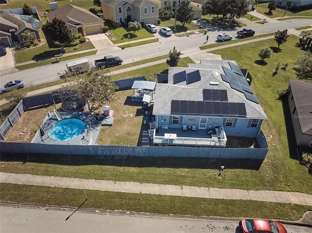 612 Chicago Way, Dundee, FL 33838 - aerial perspective of suburban area featuring a pool area