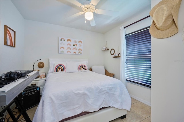 tiled bedroom with ceiling fan