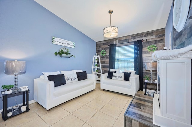 living room with light tile patterned floors and vaulted ceiling