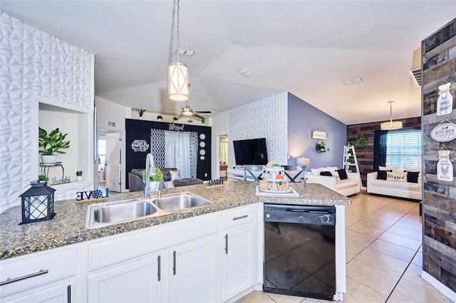 kitchen featuring sink, dishwasher, hanging light fixtures, white cabinets, and light tile patterned floors