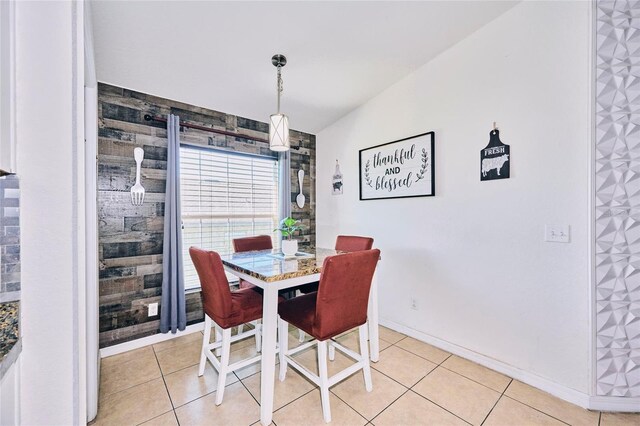 612 Chicago Way, Dundee, FL 33838 - dining room featuring light tile patterned flooring and baseboards