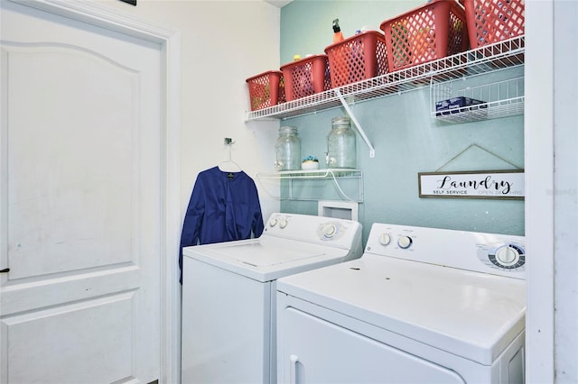 washroom with washer and clothes dryer