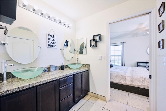 bathroom featuring vanity and tile patterned flooring