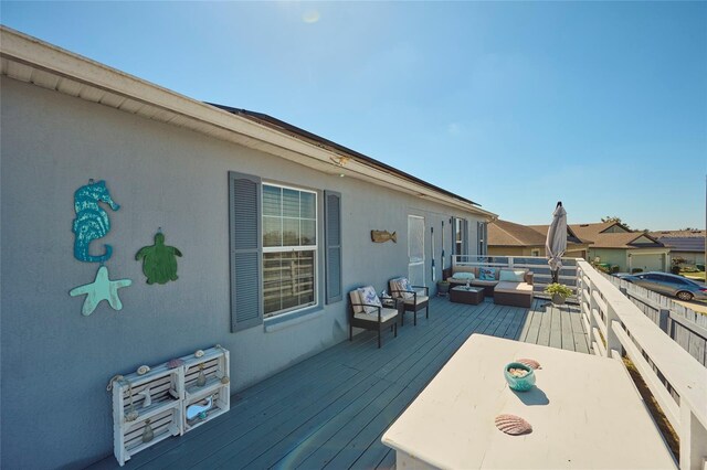 612 Chicago Way, Dundee, FL 33838 - deck with an outdoor hangout area