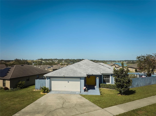 ranch-style house with a front lawn and a garage