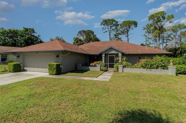 single story home with a front lawn and a garage