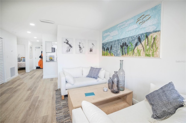 1515 Pinellas Bayway S Unit B28, Tierra Verde, FL 33715 - living area with wood finished floors, recessed lighting, and baseboards