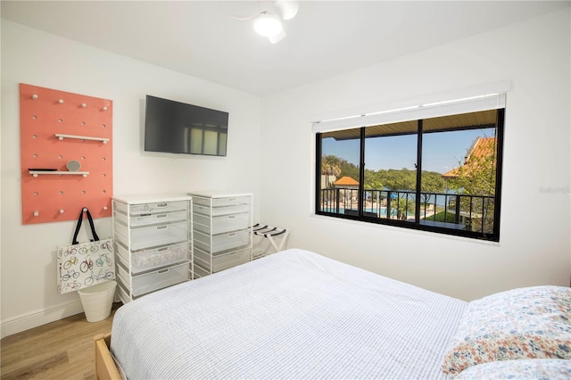 bedroom with light wood-type flooring