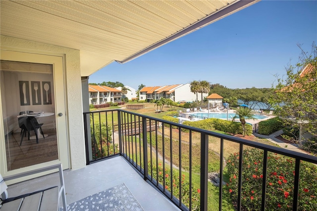 1515 Pinellas Bayway S Unit B28, Tierra Verde, FL 33715 - balcony featuring view of pool area and a residential view
