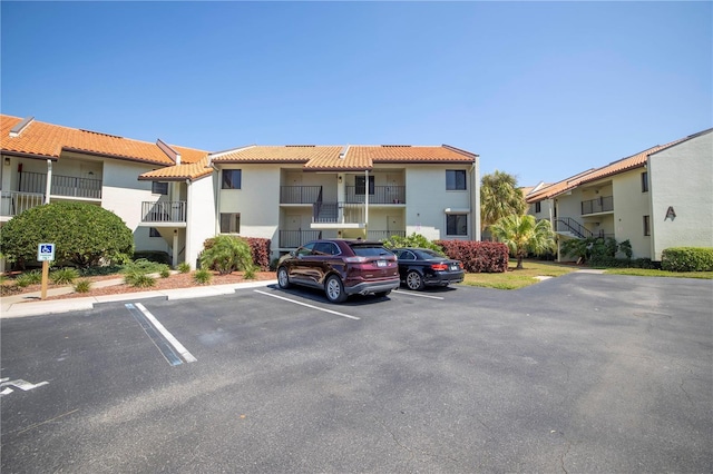 1515 Pinellas Bayway S Unit B28, Tierra Verde, FL 33715 - view of property featuring uncovered parking