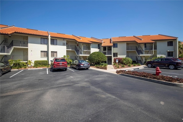 1515 Pinellas Bayway S Unit B28, Tierra Verde, FL 33715 - view of property with uncovered parking and a residential view