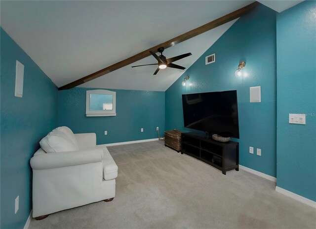 carpeted living room featuring lofted ceiling with beams and ceiling fan